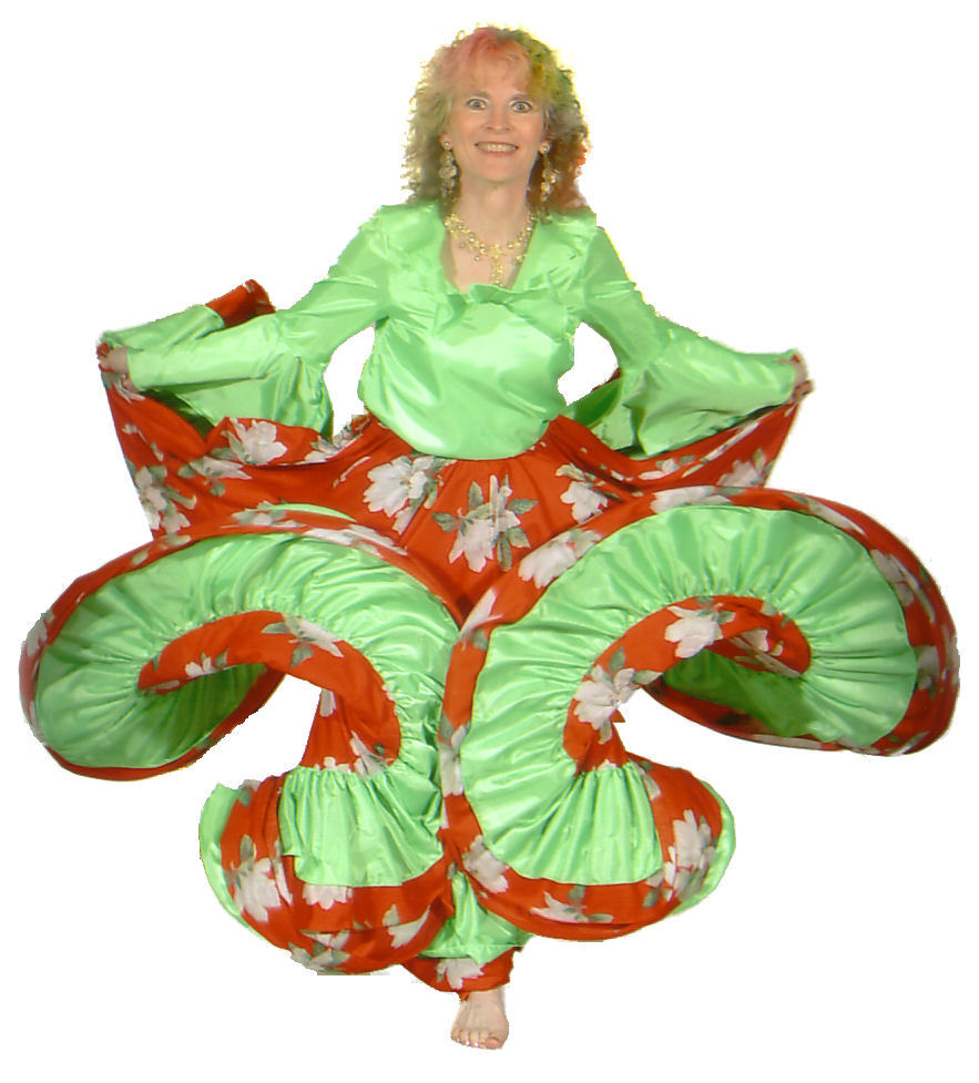 Photo of Chelydra flourishing a magnolia-print Romany skirt in a dramatic double figure-eight.